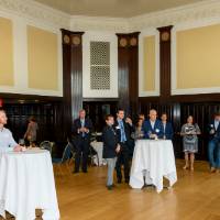 wide shot of the room during speach